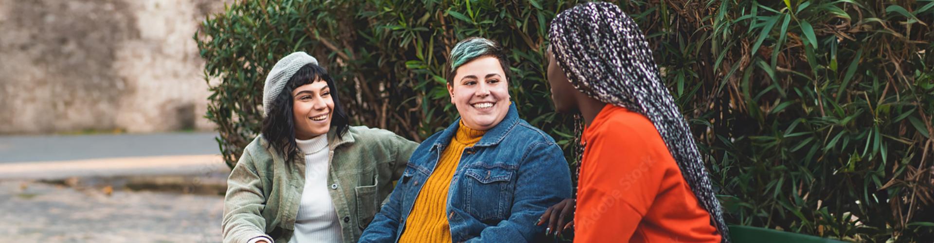 Access to Care header showing three women sitting outside.