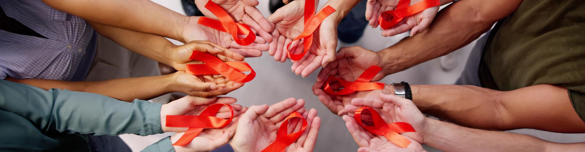 Hands with HIV Awareness Ribbons