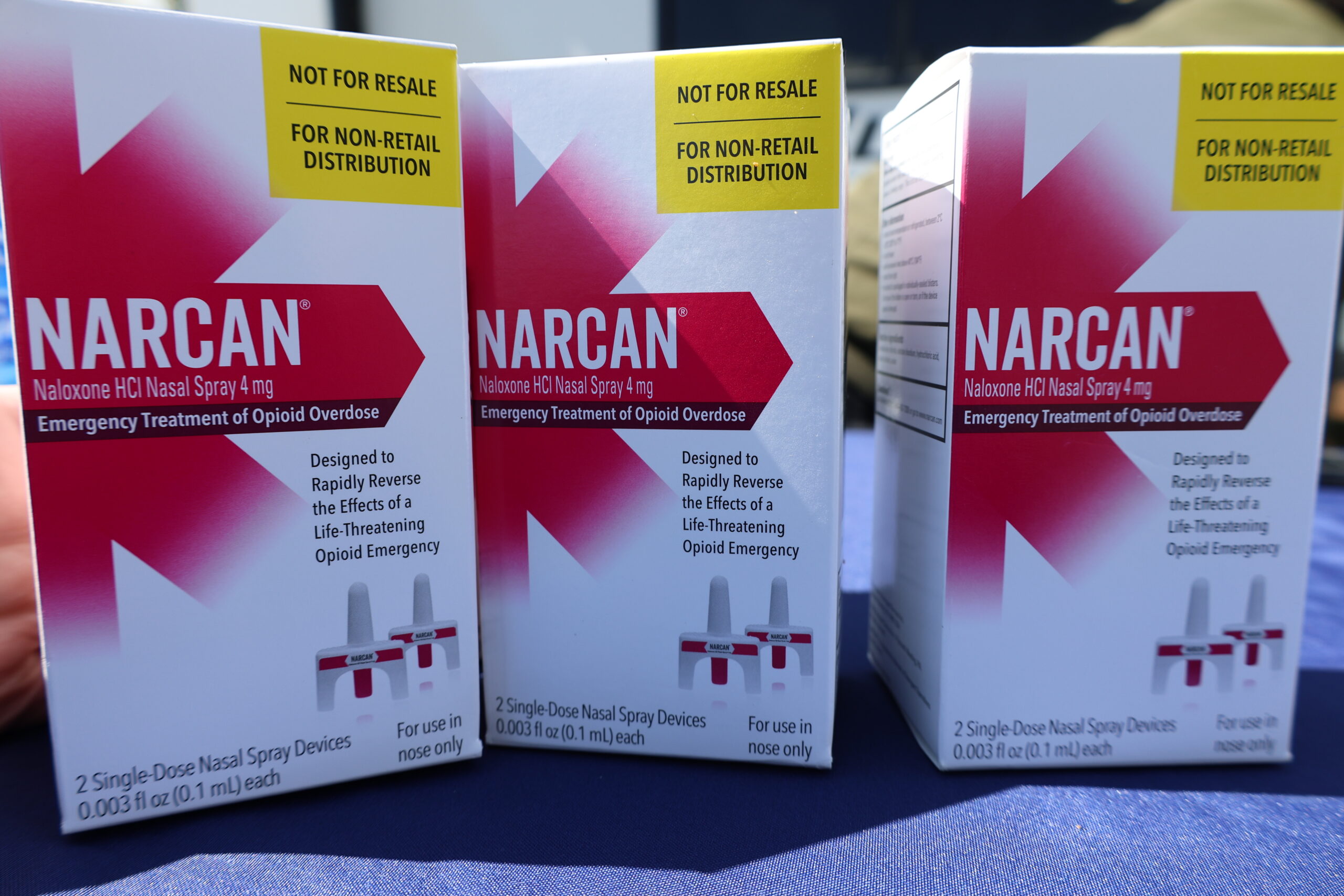 Three boxes of Narcan,, labeled for non-retail distribution, emergency treatment of opioid overdose.